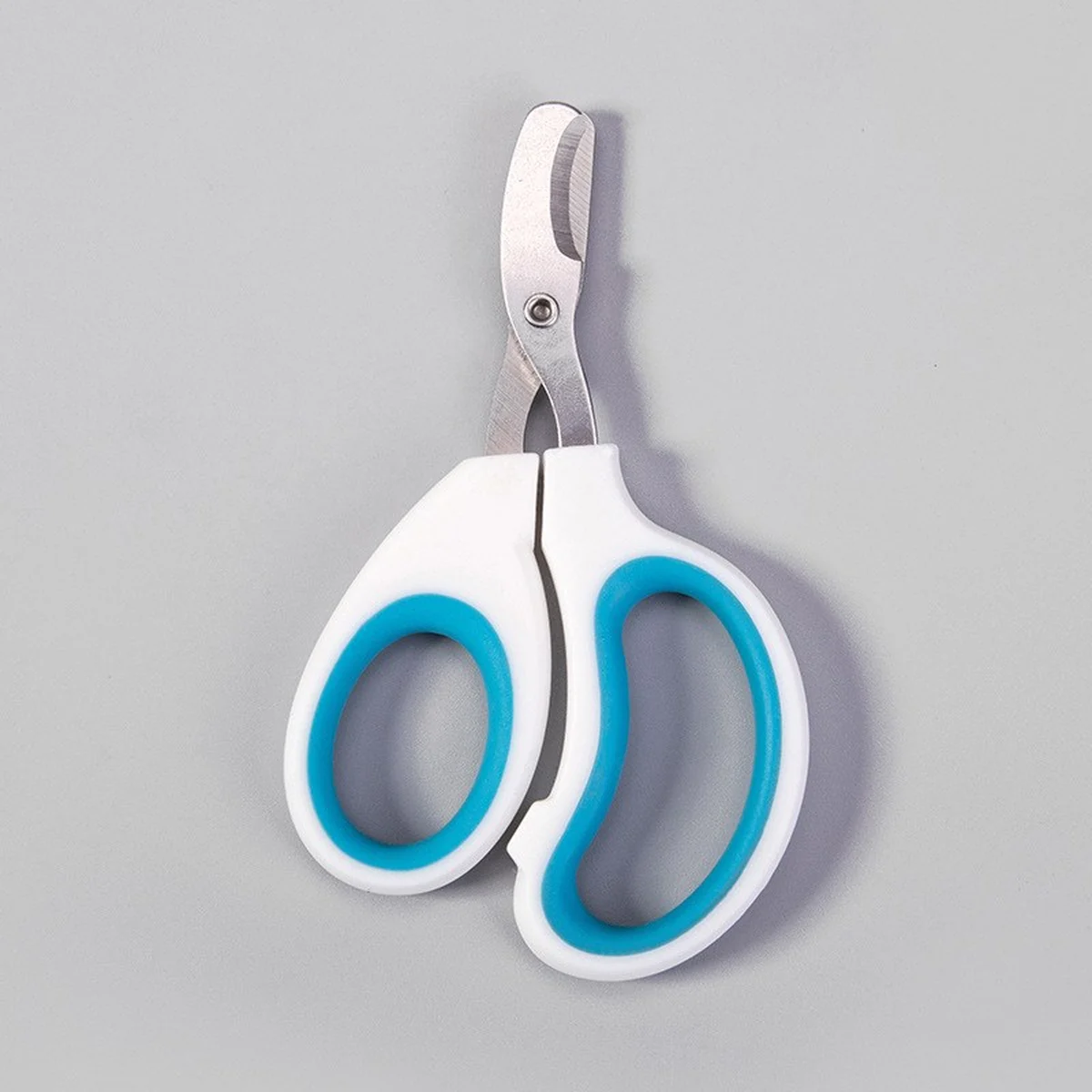 Round-tip pet nail clipper with blue grip rings