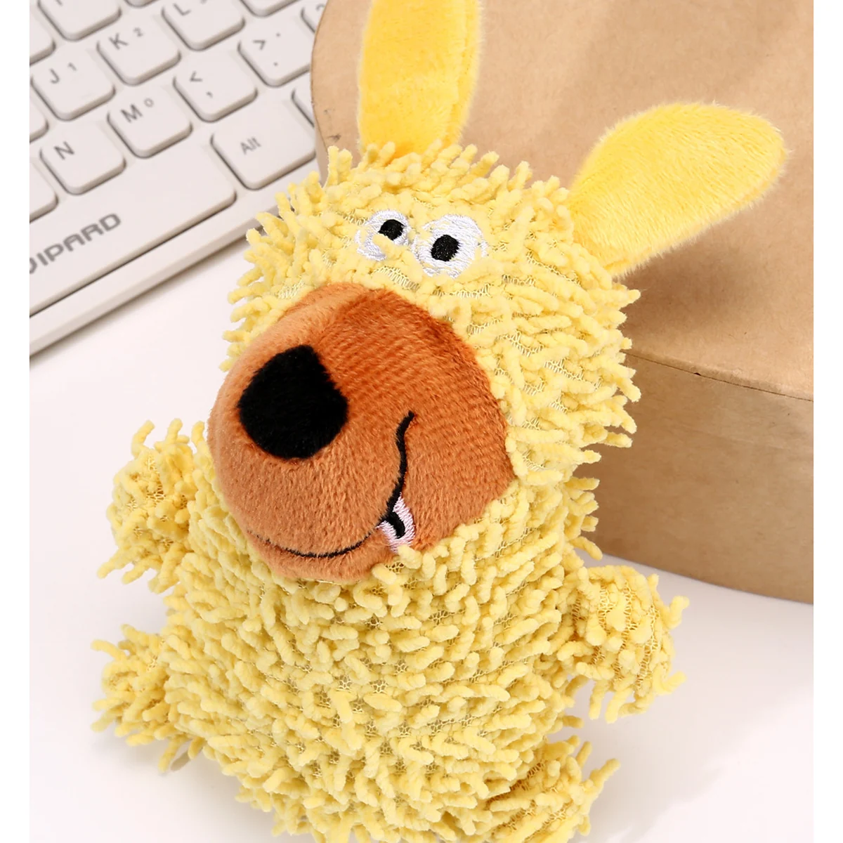 Yellow fluffy squeaky dog toy